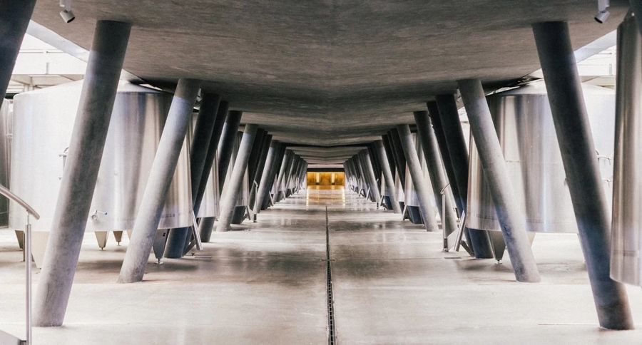Stainless steel tanks beneath the concrete roof of the VIK winery