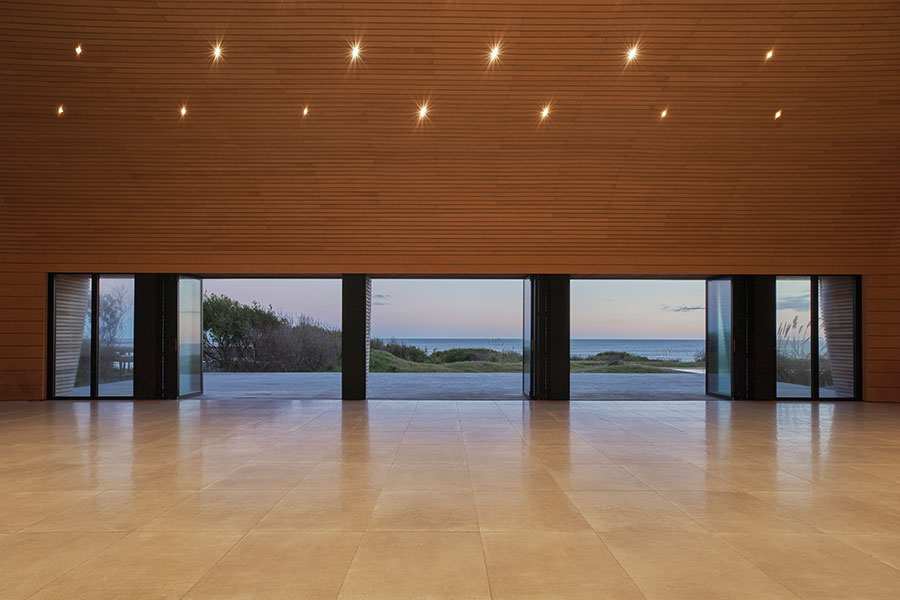 The hall, open to the sea