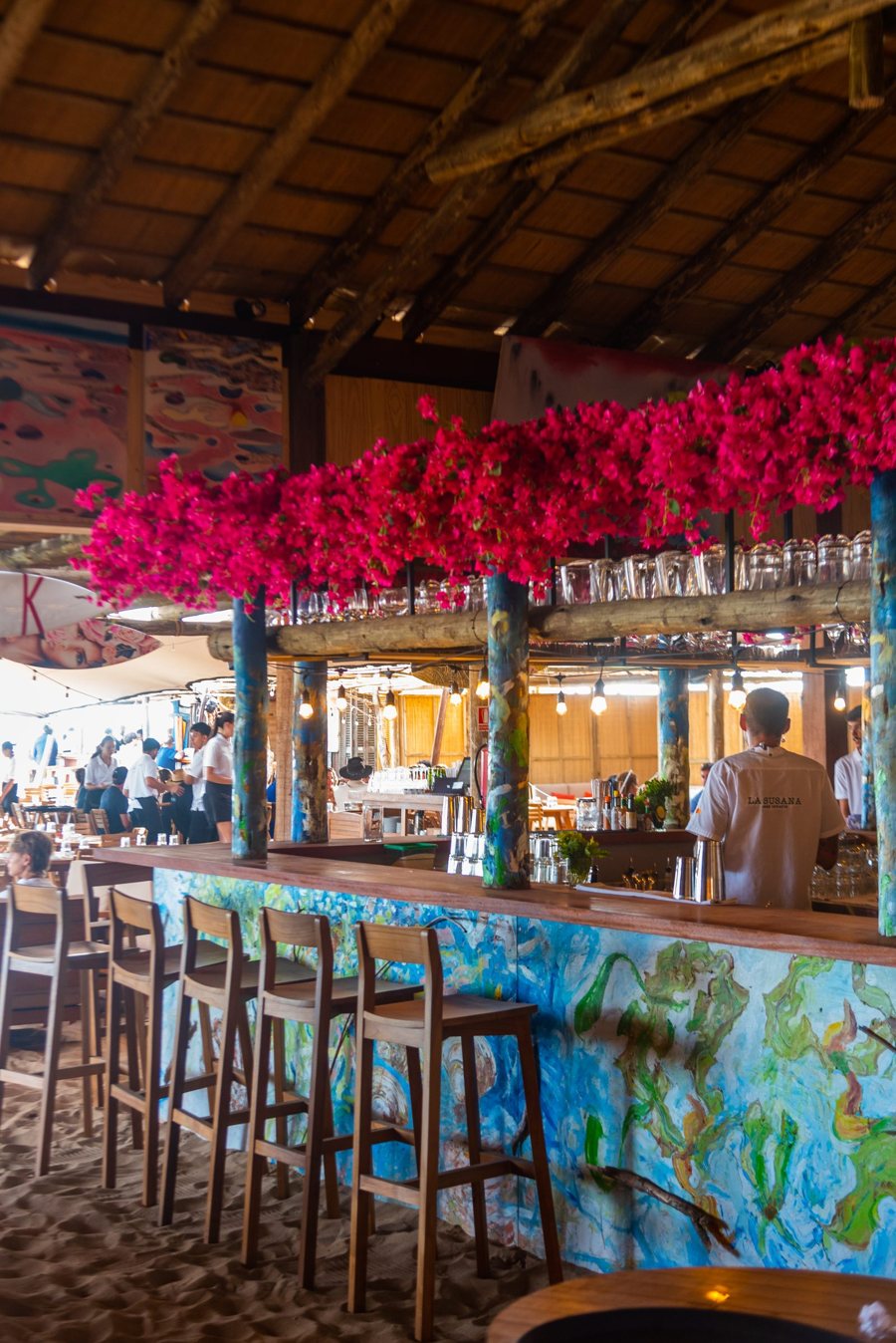 The bar, under bougainvillea