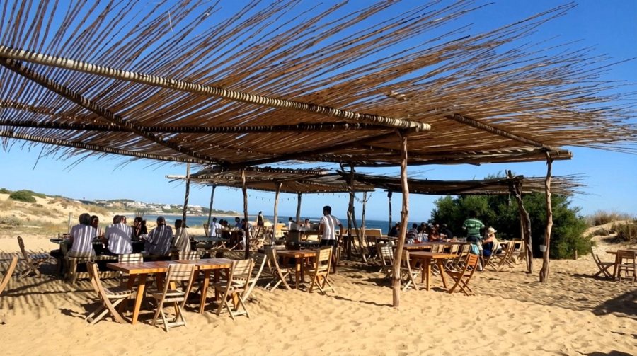 Tables under the pergolas